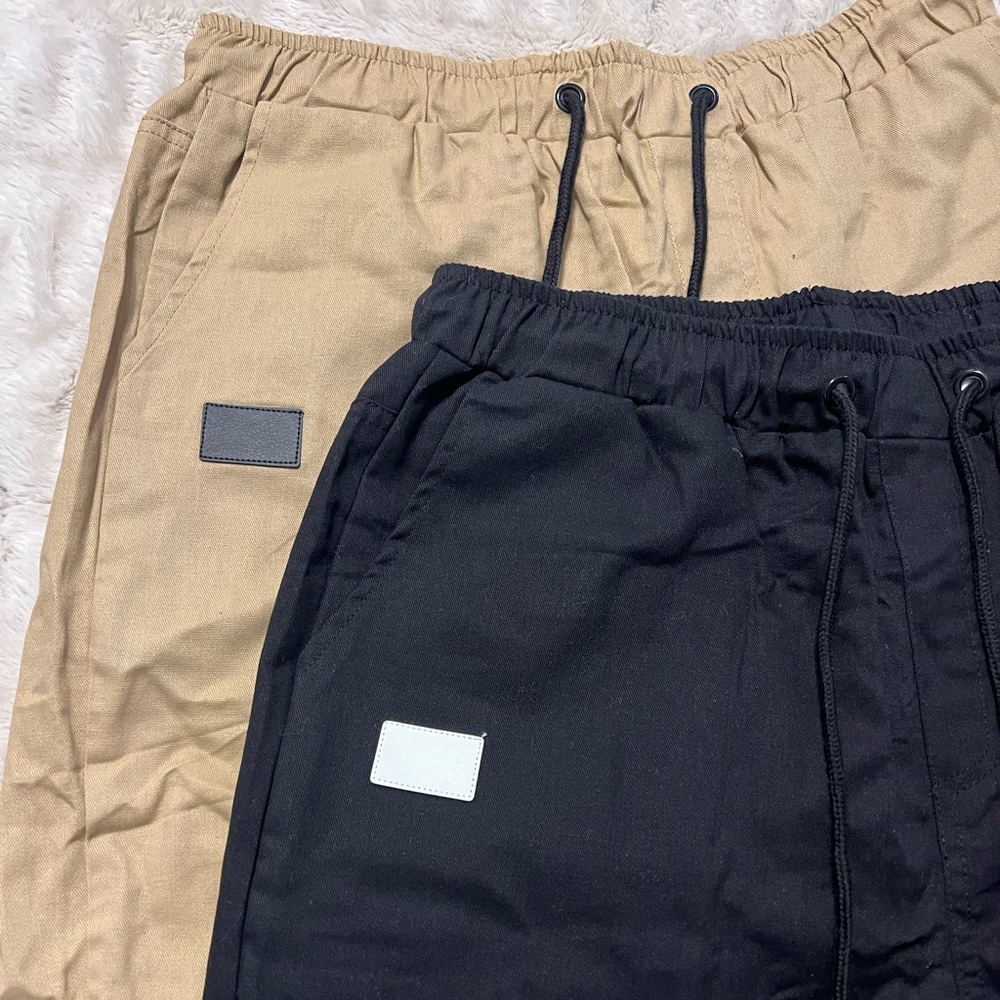 Two pack of mens drawstring shorts, never worn.